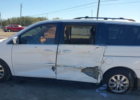 2010 Honda Odyssey Ex-L z USA, uszkodzony, nr VIN 5FNRL3H65AB007439